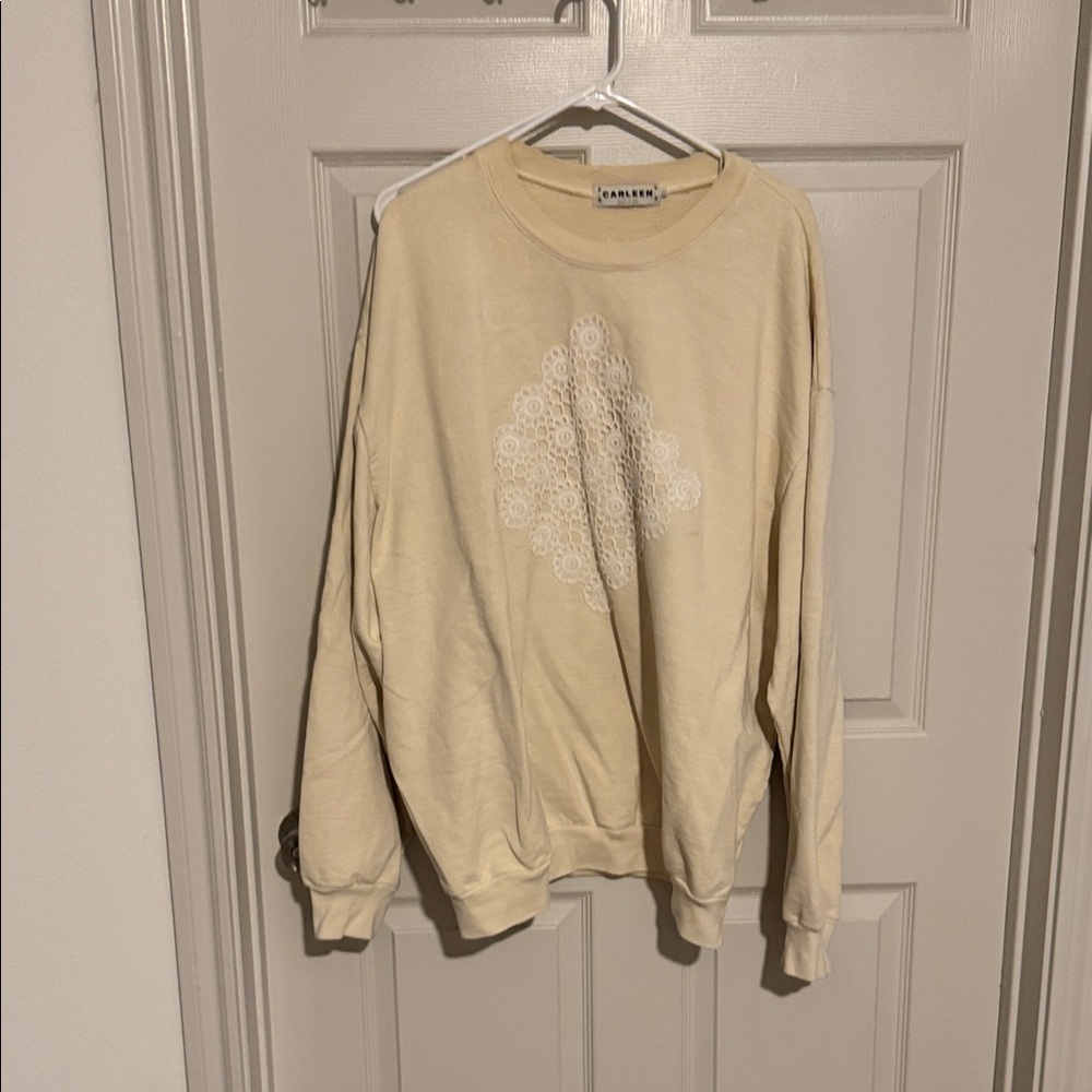 Carleen Cream Crewneck Sweatshirt with Lace-Inspired Graphic